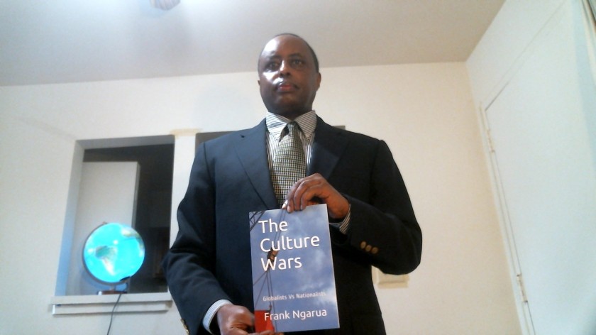 Frank Ngarua with his book The Culture Wars Globalists Vs Nationalists